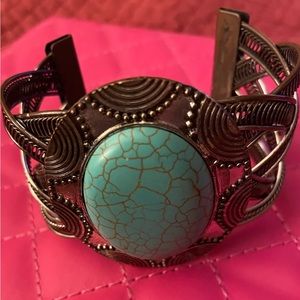 Turquoise looking Stone with cuff braided bracelet has a Western feel !